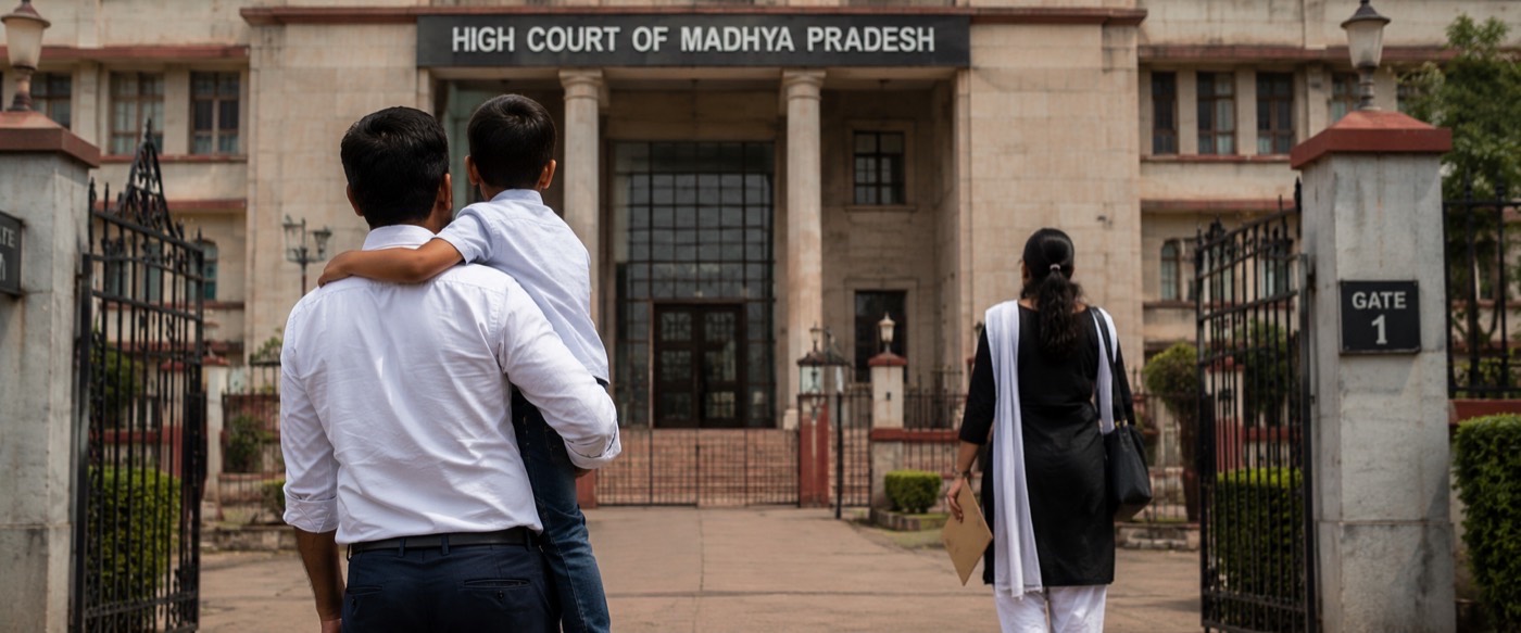 Father, son and mother outside the High Court of Madhya Pradesh
